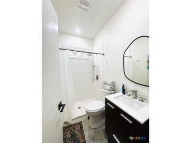 Welcome to this stunning 4-bedroom, 3-bath metal home nestled on