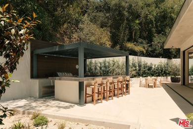 Set at the end of a private cul-de-sac in the Hollywood Hills - photo 27