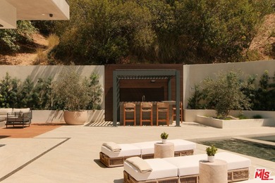 Set at the end of a private cul-de-sac in the Hollywood Hills - photo 29
