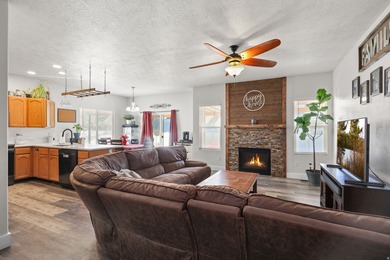 Welcome home to this beautiful Stansbury Park property where - photo 3