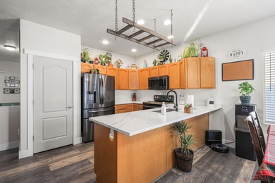 Welcome home to this beautiful Stansbury Park property where - photo 7