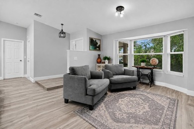 Beautifully updated 4BR/2BA pool home located in the highly - photo 13