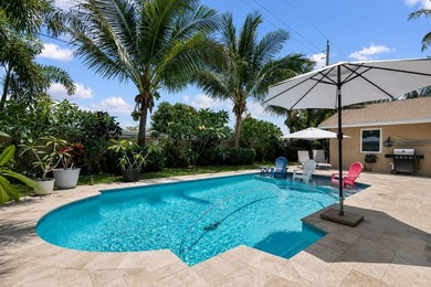 Beautifully updated 4BR/2BA pool home located in the highly - photo 25