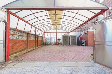 Welcome to this beautifully renovated legal two-family brick - photo 22