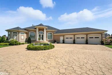 Nestled within an exclusive gated golf course community, this - photo 1