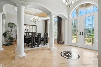 Nestled within an exclusive gated golf course community, this - photo 2