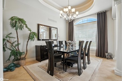 Nestled within an exclusive gated golf course community, this - photo 3