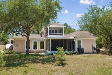 Tucked away in a secluded setting, this impressive three-bedroom - photo 32