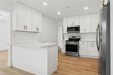 Look at this totally renovated home with a great location in - photo 8