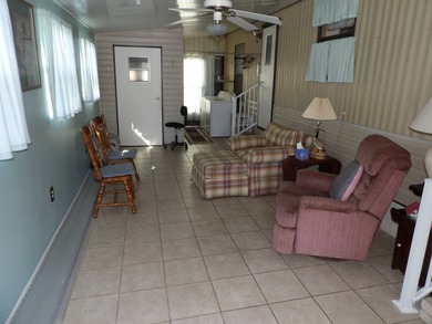 This cozy and partially furnished, 12 X 33 1 BR 1 BA home with - photo 8