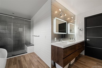 Set on an approximately 6,000 SF corner lot, this luxury - photo 13