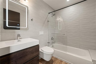 Set on an approximately 6,000 SF corner lot, this luxury - photo 16
