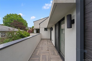 Set on an approximately 6,000 SF corner lot, this luxury - photo 20
