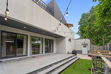 Set on an approximately 6,000 SF corner lot, this luxury - photo 22
