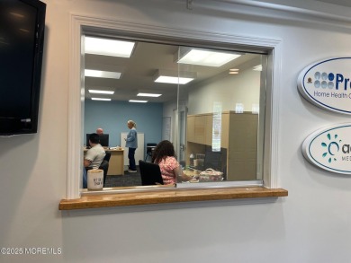 2 story office professional building located on Main Street in