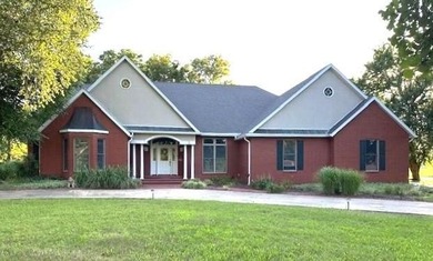 This gorgeous three-to-four-bedroom home is setting on a - photo 1