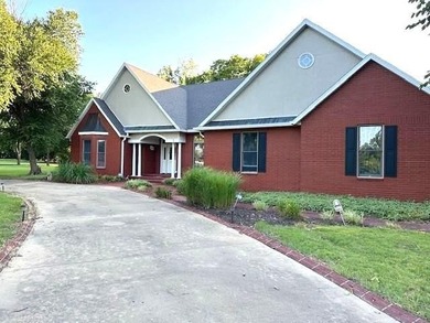 This gorgeous three-to-four-bedroom home is setting on a - photo 2