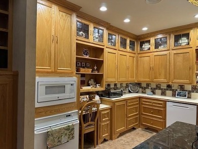 This gorgeous three-to-four-bedroom home is setting on a - photo 5