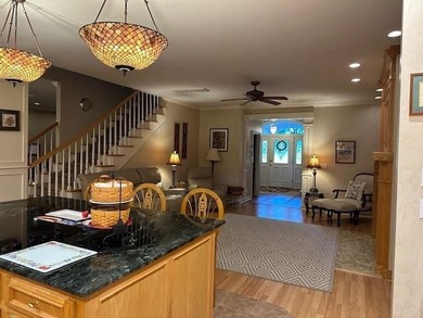 This gorgeous three-to-four-bedroom home is setting on a - photo 10
