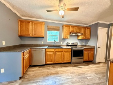 Set on a full acre in the desirable Laguna Shores subdivision on - photo 12