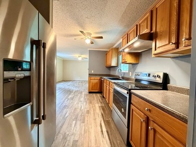 Set on a full acre in the desirable Laguna Shores subdivision on - photo 13