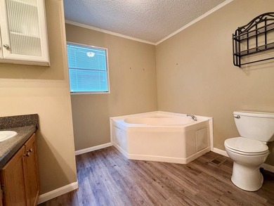 Set on a full acre in the desirable Laguna Shores subdivision on - photo 17