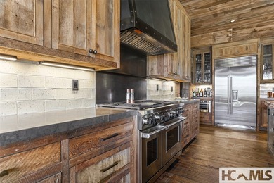 Nestled within the prestigious Mountaintop Golf & Lake Club in - photo 22
