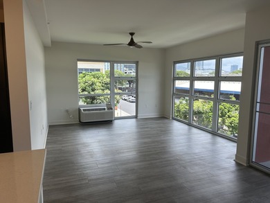 Corner unit, Overlooks a mini park, LVT throughout Enjoy this is - photo 4