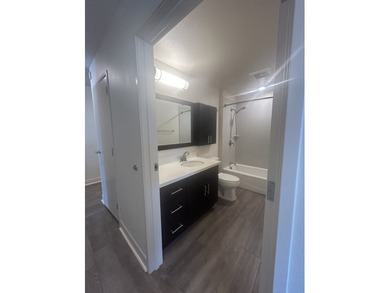 Corner unit, Overlooks a mini park, LVT throughout Enjoy this is - photo 10