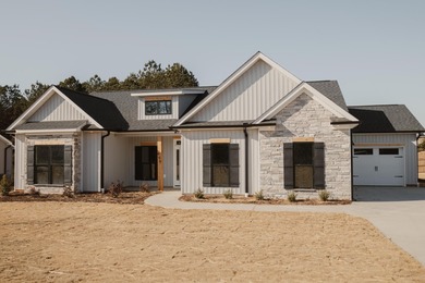 Another Custom Featured Home Under Construction! This beautiful