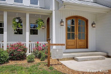 Welcome to 7067 118th, an enchanting Southern cottage just - photo 4