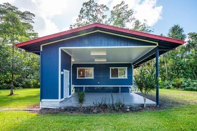 Tucked away on a lush 1-acre lot in Hawaiian Paradise Park, this - photo 2