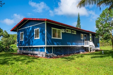 Tucked away on a lush 1-acre lot in Hawaiian Paradise Park, this - photo 3