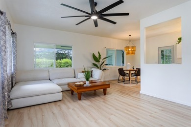 Tucked away on a lush 1-acre lot in Hawaiian Paradise Park, this - photo 5