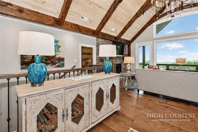 Experience elegant mountain living in this warm and inviting - photo 12
