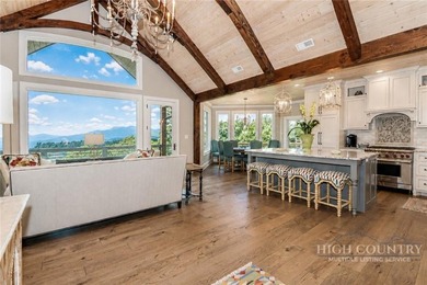 Experience elegant mountain living in this warm and inviting - photo 13