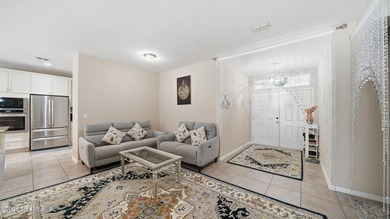 This beautifully maintained 5-bedroom, 3-bathroom single-story - photo 3