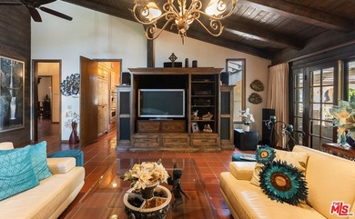 Welcome to this magnificent Spanish-style estate in the - photo 4