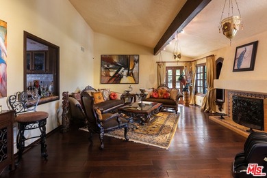 Welcome to this magnificent Spanish-style estate in the - photo 5