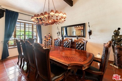 Welcome to this magnificent Spanish-style estate in the - photo 6