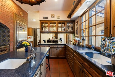 Welcome to this magnificent Spanish-style estate in the - photo 10
