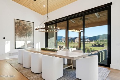 Set on more than four pristine acres beneath the iconic backdrop - photo 11