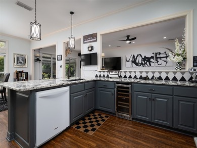 Discover the comfort of this exquisite four bedroom, three bath - photo 11
