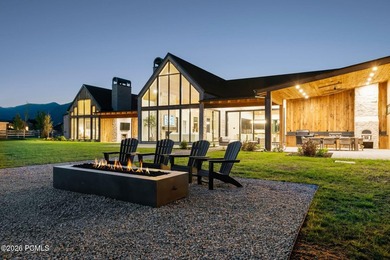 Set on more than four pristine acres beneath the iconic backdrop - photo 13