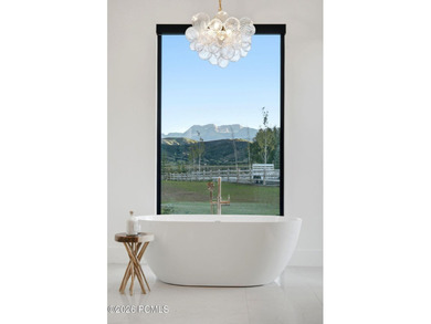 Set on more than four pristine acres beneath the iconic backdrop - photo 18