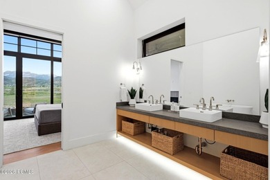 Set on more than four pristine acres beneath the iconic backdrop - photo 26