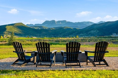 Set on more than four pristine acres beneath the iconic backdrop - photo 32