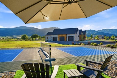 Set on more than four pristine acres beneath the iconic backdrop - photo 38