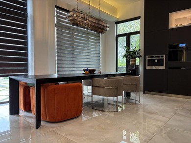 Welcome to a masterpiece of modern elegance set on a coveted - photo 5