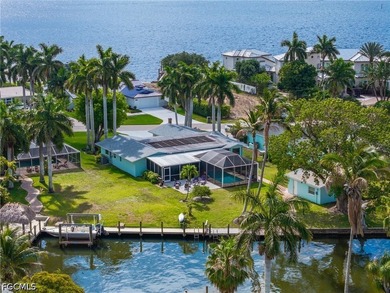 A Truly Unique Cape Coral Property! Welcome to *Tradewinds*, a - photo 1